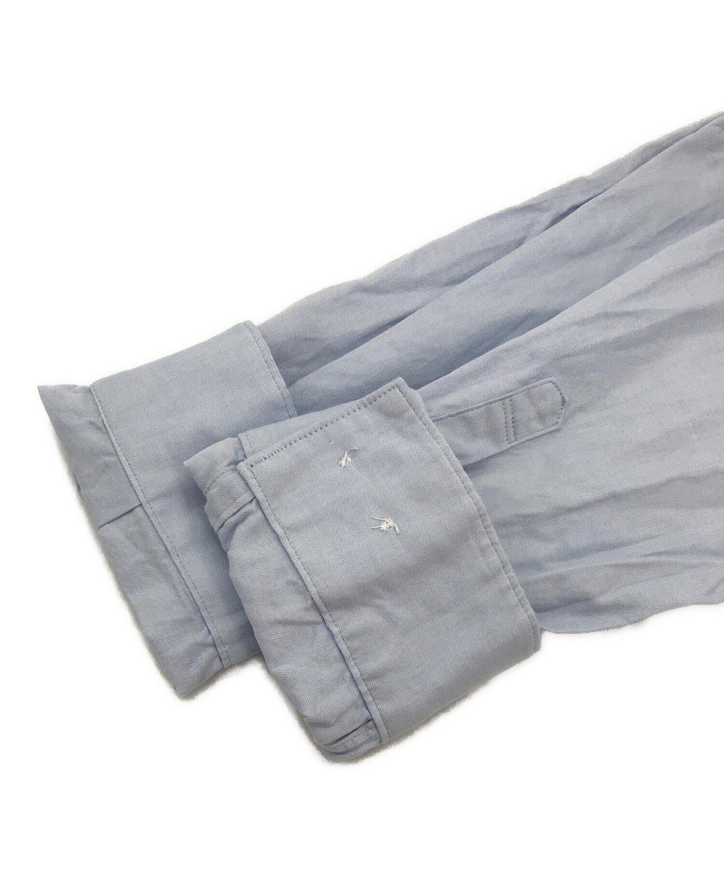 สายลับปุ่มปักจุดหนึ่งเสื้อเชิ้ตเสื้อเชิ้ตเสื้อแขนยาว UC2B9402