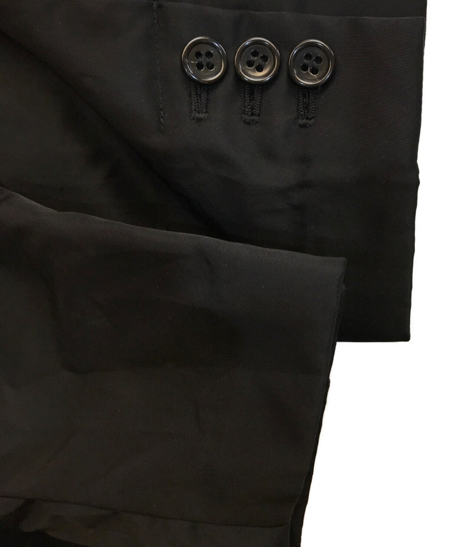 Black Comme des Garcons는 긴 코트 1C-J040을 주름 쳤다