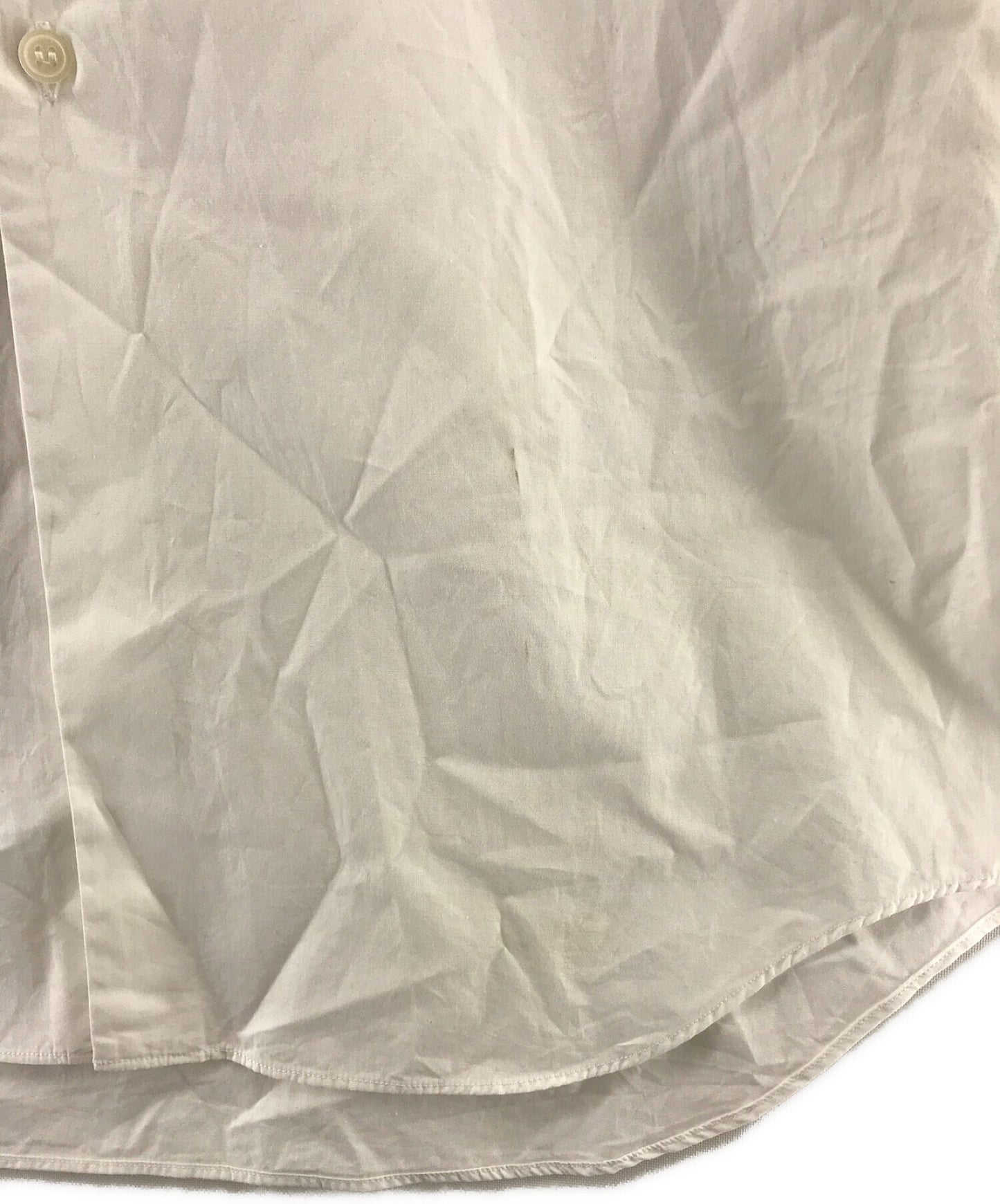 Black Comme des Garcons ออกแบบเสื้อเชิ้ตยาว