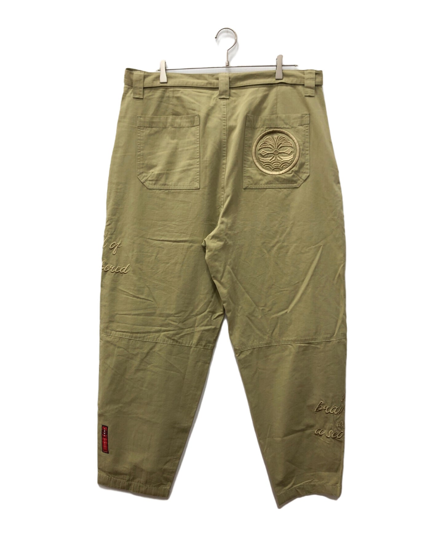 [Pre-owned] EVISU Loose-Fit Pants with Family Crest and Slogan Embroidery