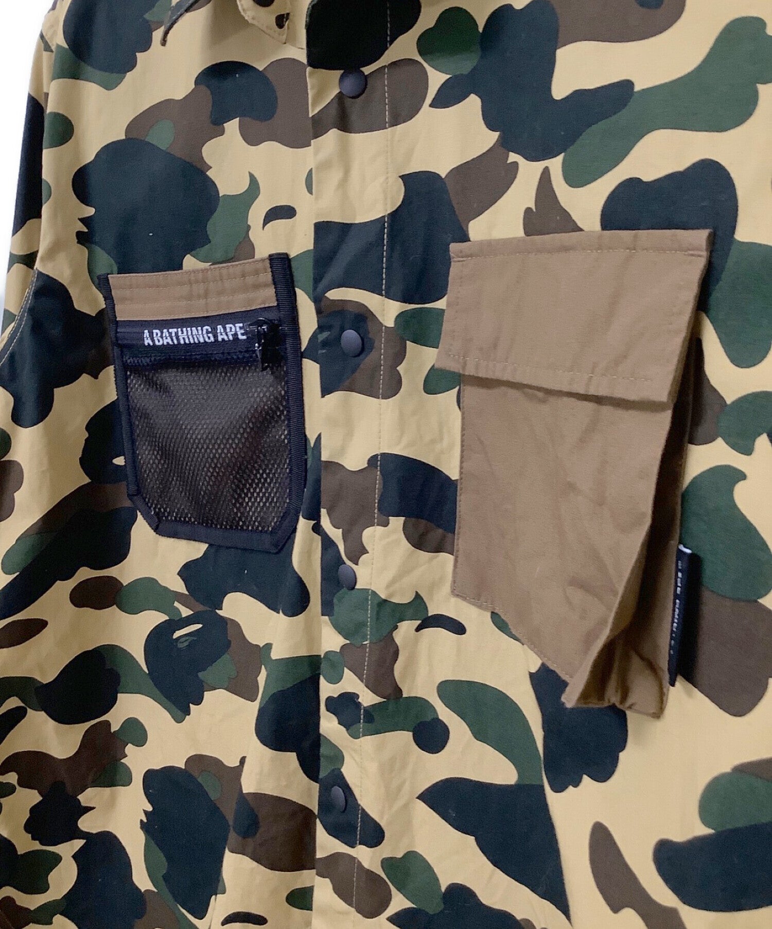 A BATHING APE 1ST CAMO OUTDOOR DETAIL POCKET RELAXED FIT SHIRT 001SHI801004M