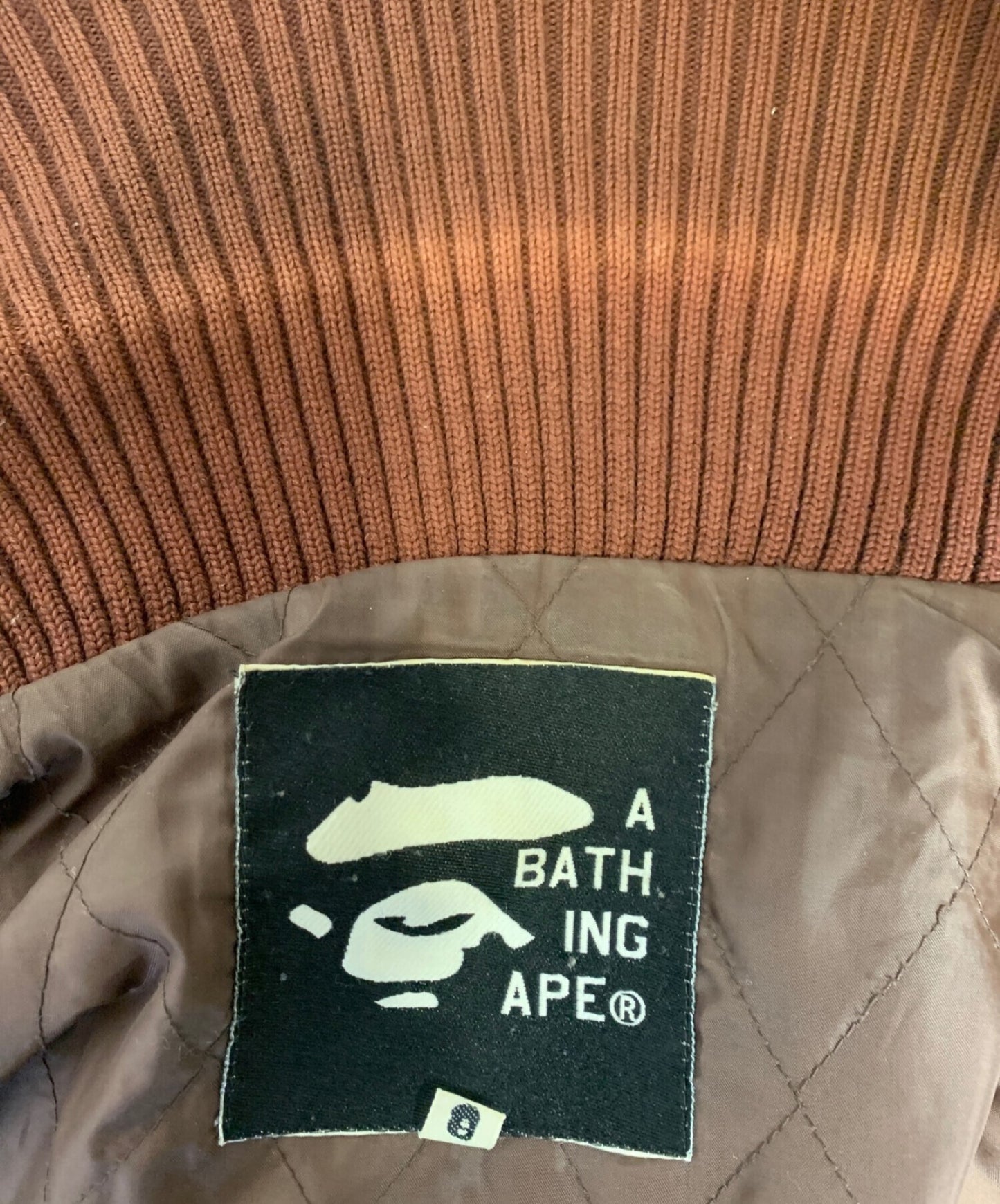 팀의 로고가있는 목욕 원숭이 × 이웃 재킷
