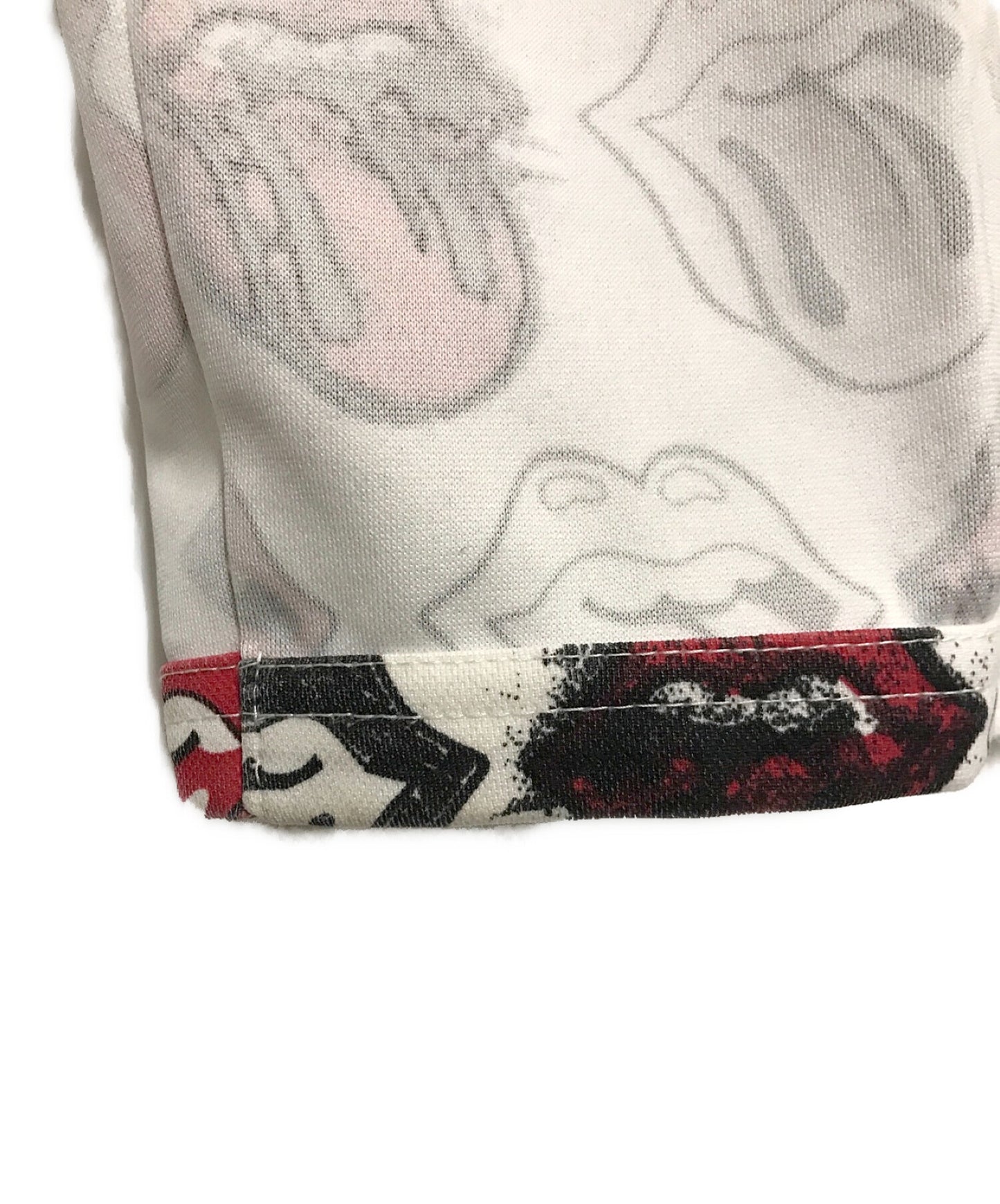 [Pre-owned] COMME des GARCONS HOMME PLUS Rip and tan all-over print cut and sewn PQ-T001