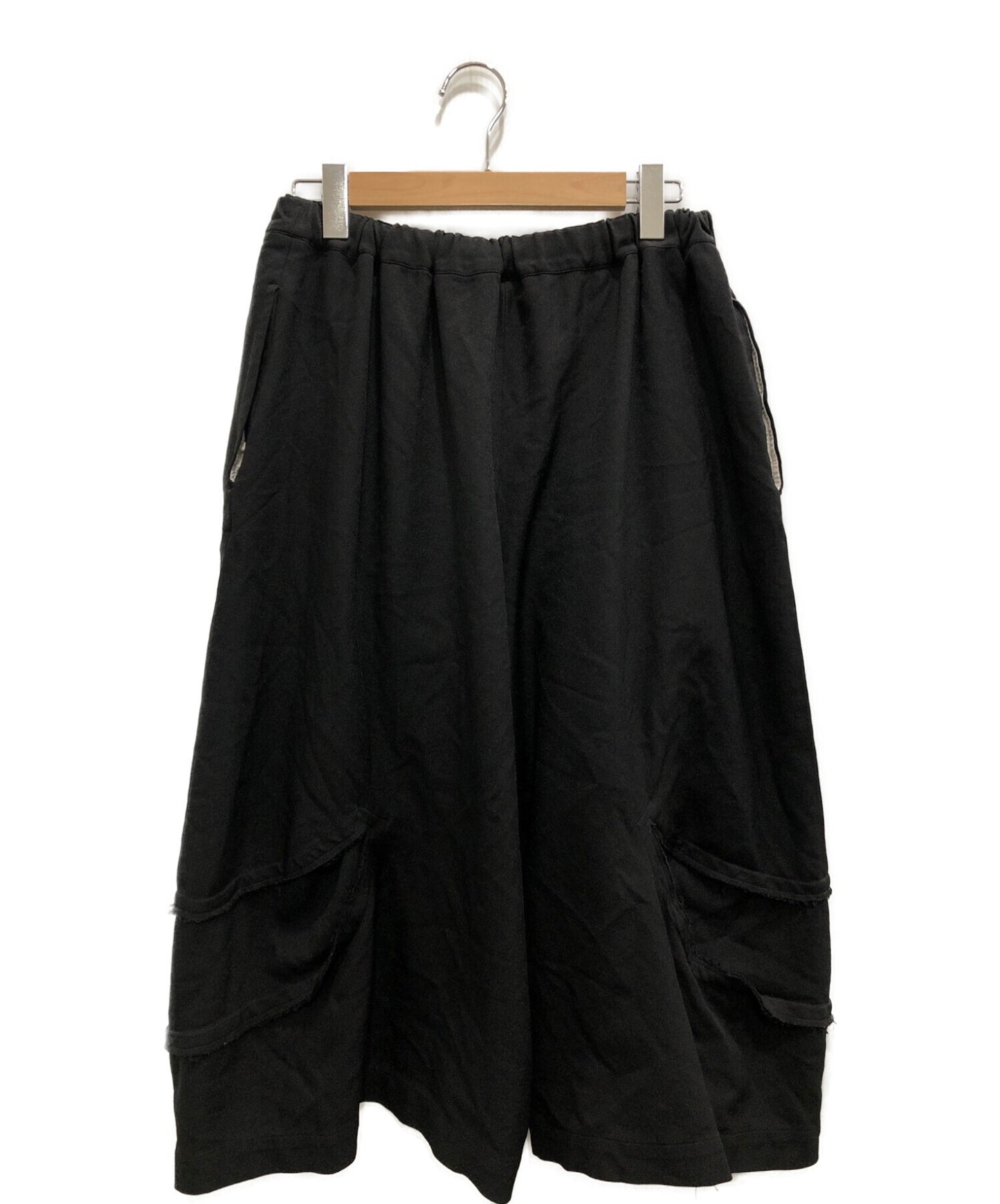 黑色COMME DES GARCONS修饰受损的宽裤1A-P001