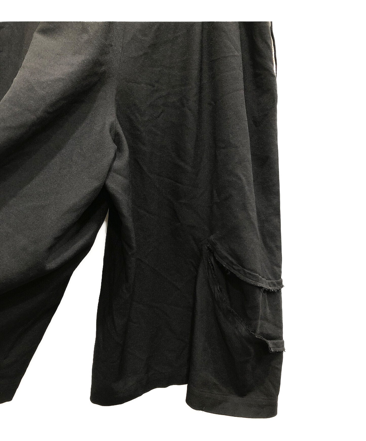 黑色COMME DES GARCONS修飾受損的寬褲1A-P001
