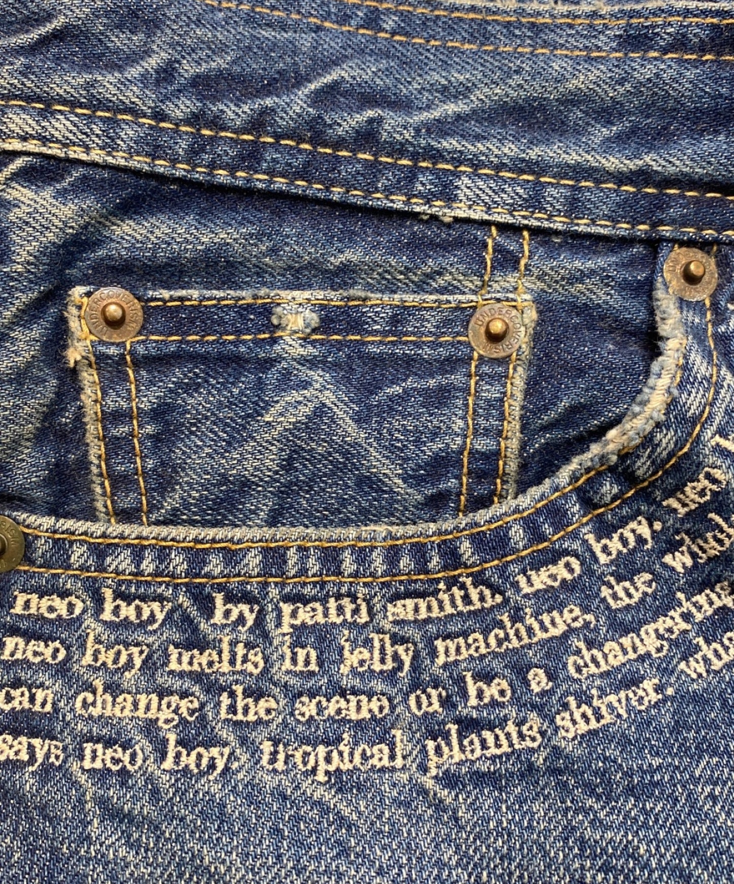 [Pre-owned] UNDERCOVER Patti Smith lyrics embroidery repaired denim pants C4521